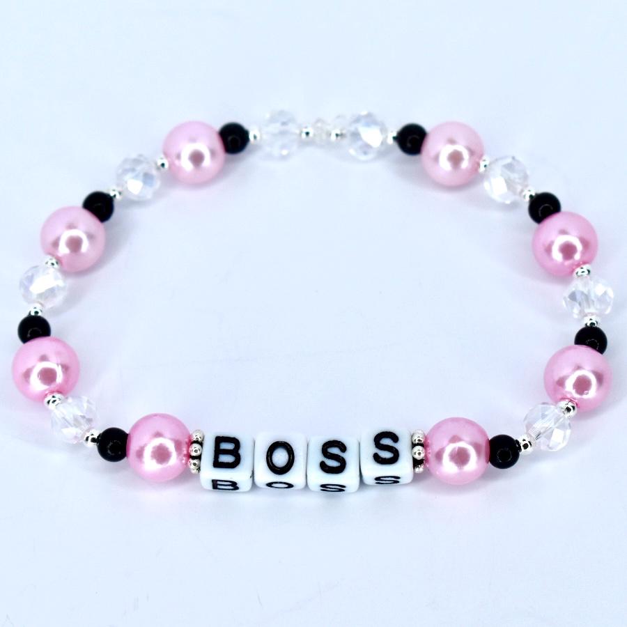 Pink pearl boss bracelet with black and clear crystal beads and white letter beads spelling BOSS handmade gift for boss or coworker.