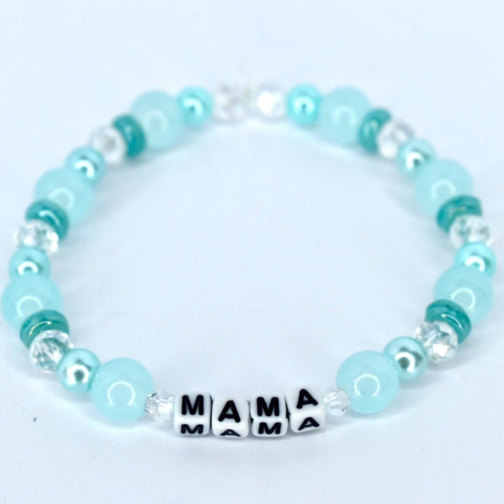 Mama bracelet with green and white pearl beads, crystal accents, and letter beads spelling MAMA handmade mom jewelry gift.