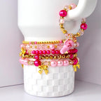 Ibiza Sunset Bracelet Collection: Pink and Gold Beaded Bracelets with Bow Charm