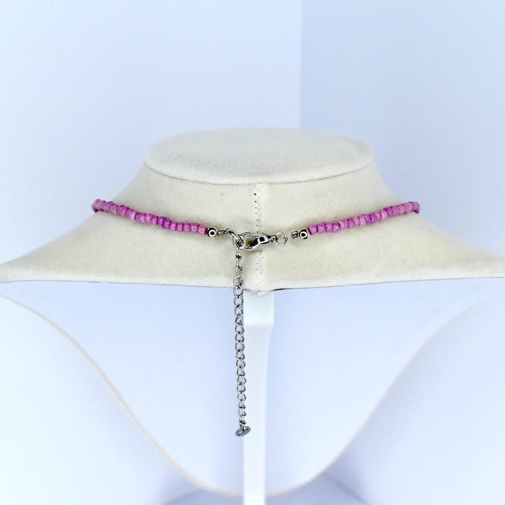 Pink beaded necklace with adjustable silver chain and lobster clasp – handmade minimalist jewelry.