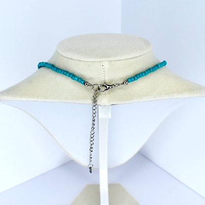 Turquoise seed bead necklace with adjustable silver chain and lobster clasp – handmade minimalist jewelry.