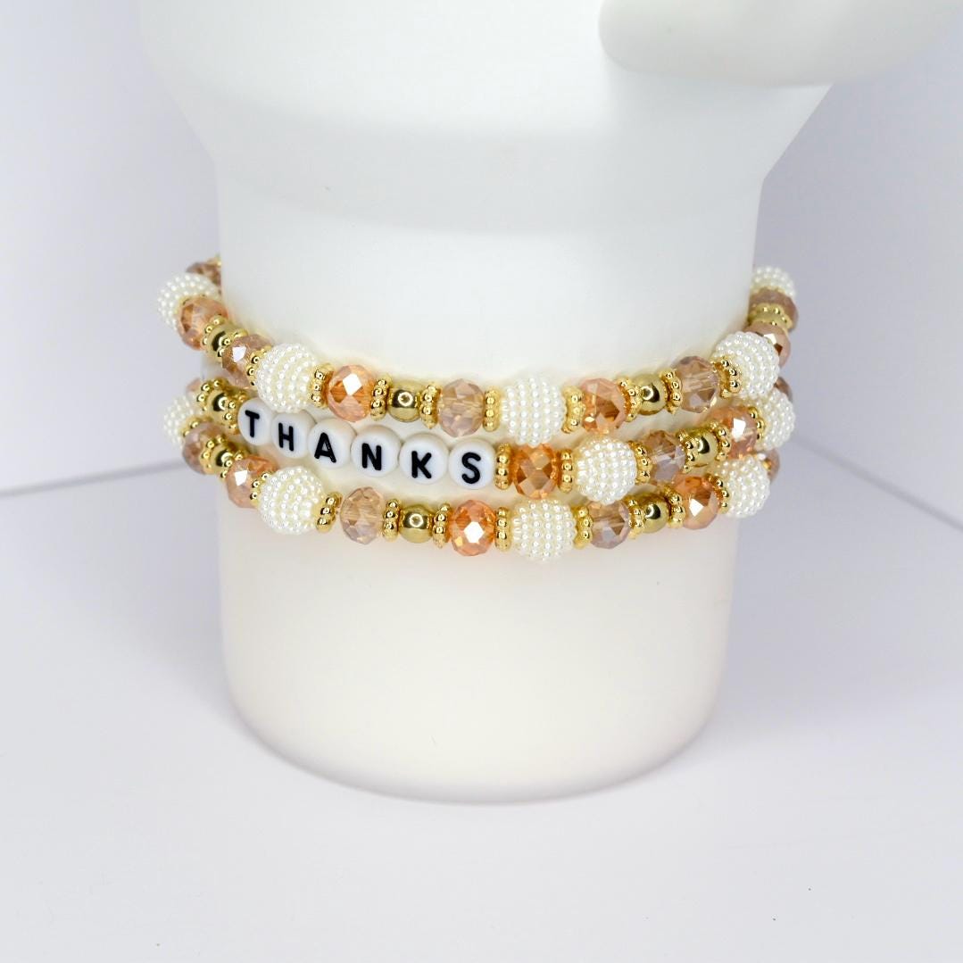 Fall tumbler bracelet with gold, white, and crystal beads – ‘Give Thanks’ beaded wrap for autumn drinkware and Thanksgiving gifts.