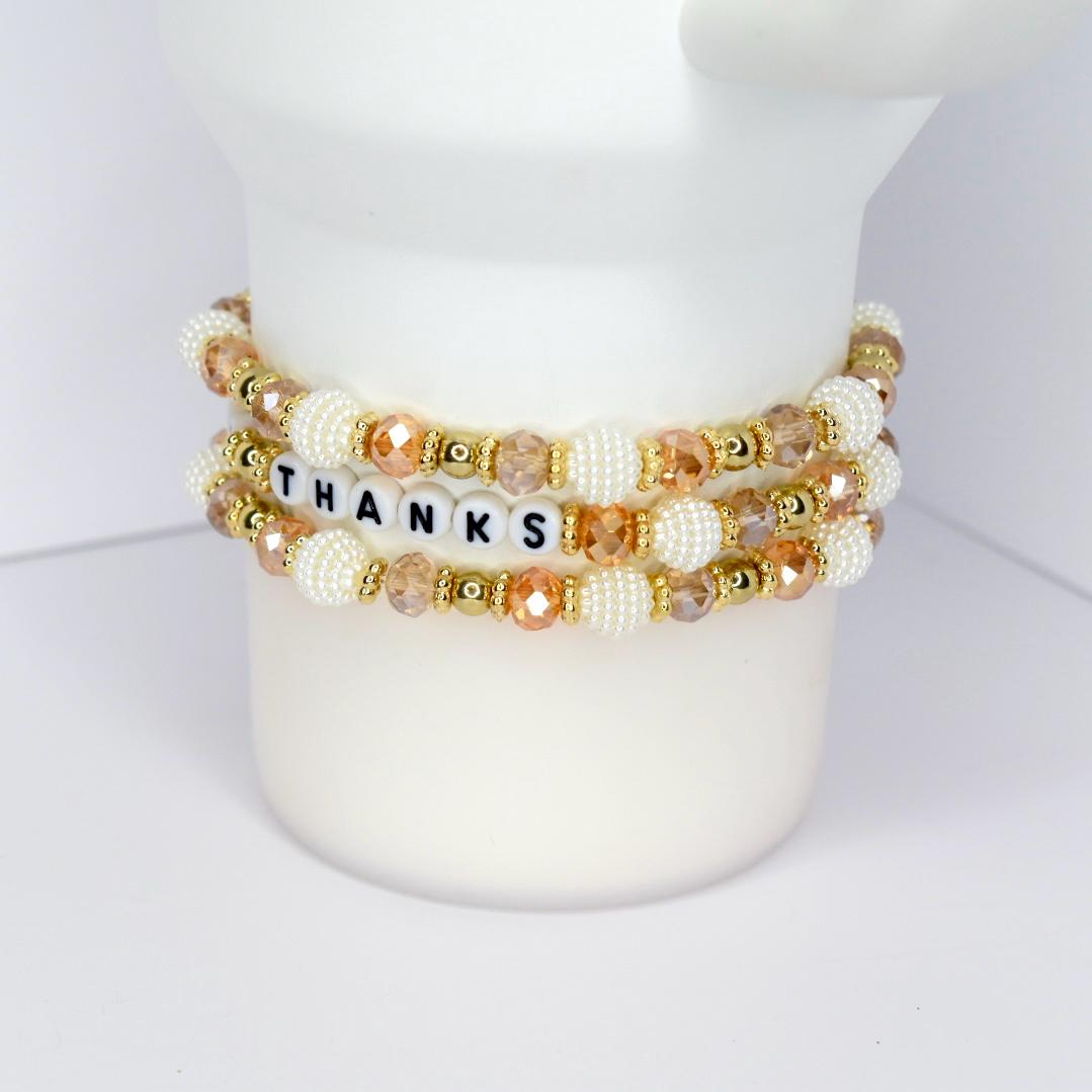 Fall tumbler bracelet with gold, white, and crystal beads – ‘Give Thanks’ beaded wrap for autumn drinkware and Thanksgiving gifts.