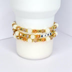 Gratitude tumbler bracelet – handmade beaded wrap with gold and white accents and ‘Give Thanks’ beads for fall celebrations.