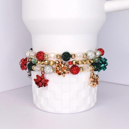 christmas bracelet stack holiday tumbler bracelets set christmas jewelry bow charm beaded accessory festive wrist band decoration stanley cup christmas gift red green sparkle bracelet