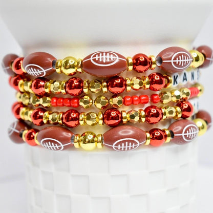 Kansas City Chiefs Tumbler Bracelet Beaded Jewelry Set Red Gold White Football Beads Letter Accent Stretchy Elastic Band Design Stack of 5 Drinkware Charm or Wrist Accessory Perfect Game Day Gift