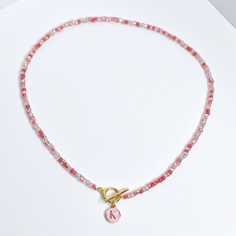 Personalized Beaded Necklace Jewelry Glass Bead Strand Red Pink White Color Mix Gold Toggle Clasp Design Custom Initial Pendant Letter Charm Accent Stylish Handmade Jewelry Collection Gift Idea