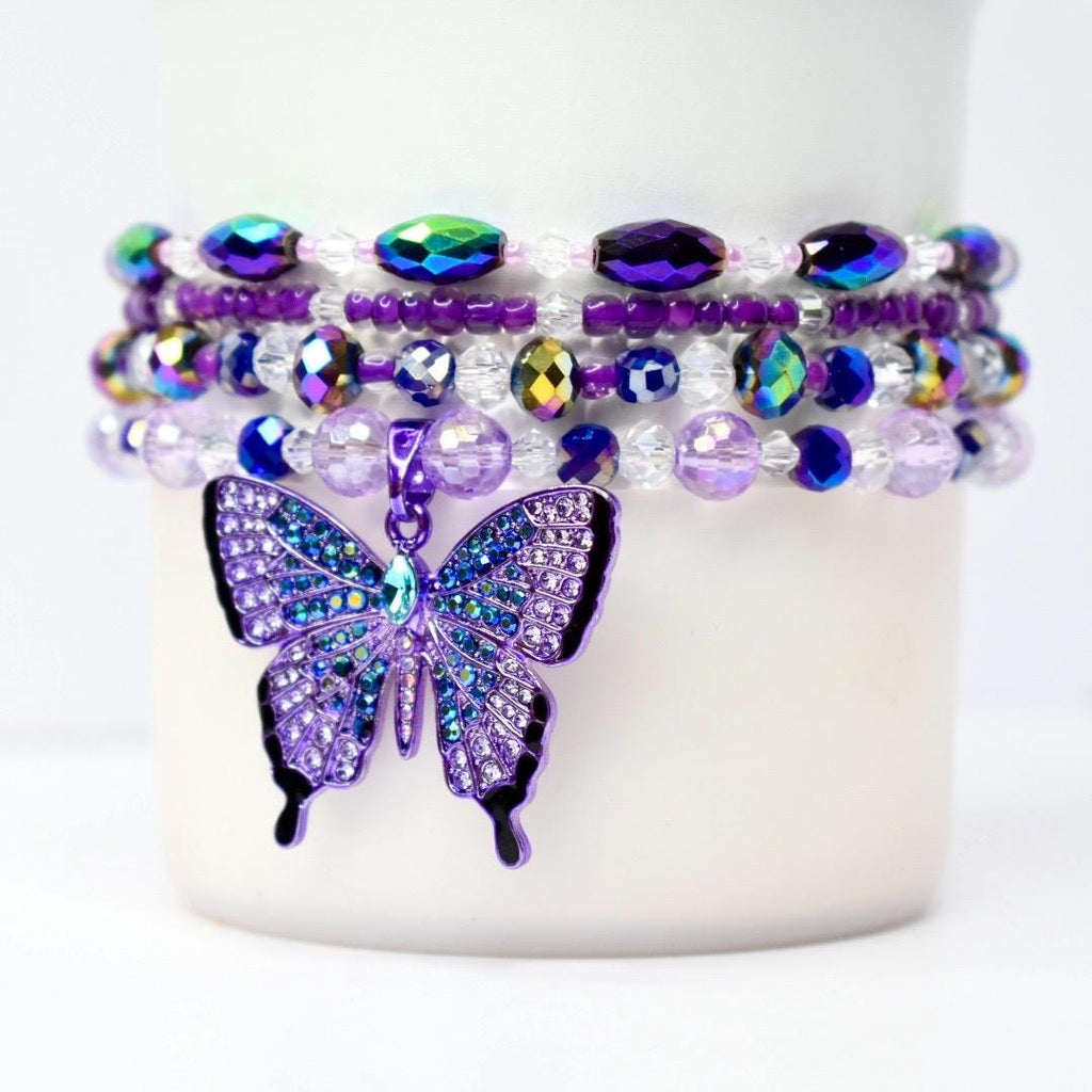 Side view of the bracelet set on a 40 oz tumbler, showing how the bracelets wrap and layer around the base.