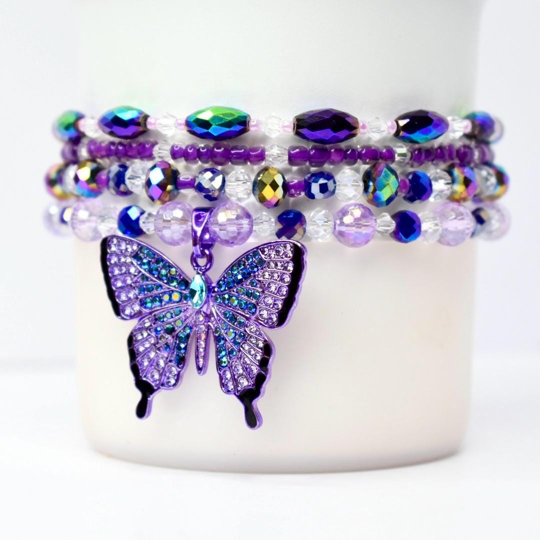 Side view of the bracelet set on a 40 oz tumbler, showing how the bracelets wrap and layer around the base.