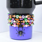 Cute Halloween tumbler charm bracelets – colorful beaded wraps with ghosts, pumpkins, skulls, and spider charms for festive drinkware accessories.