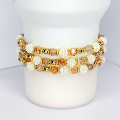 Thanksgiving beaded tumbler bracelet – autumn-inspired wrap with gold accents and ‘Give Thanks’ lettering.