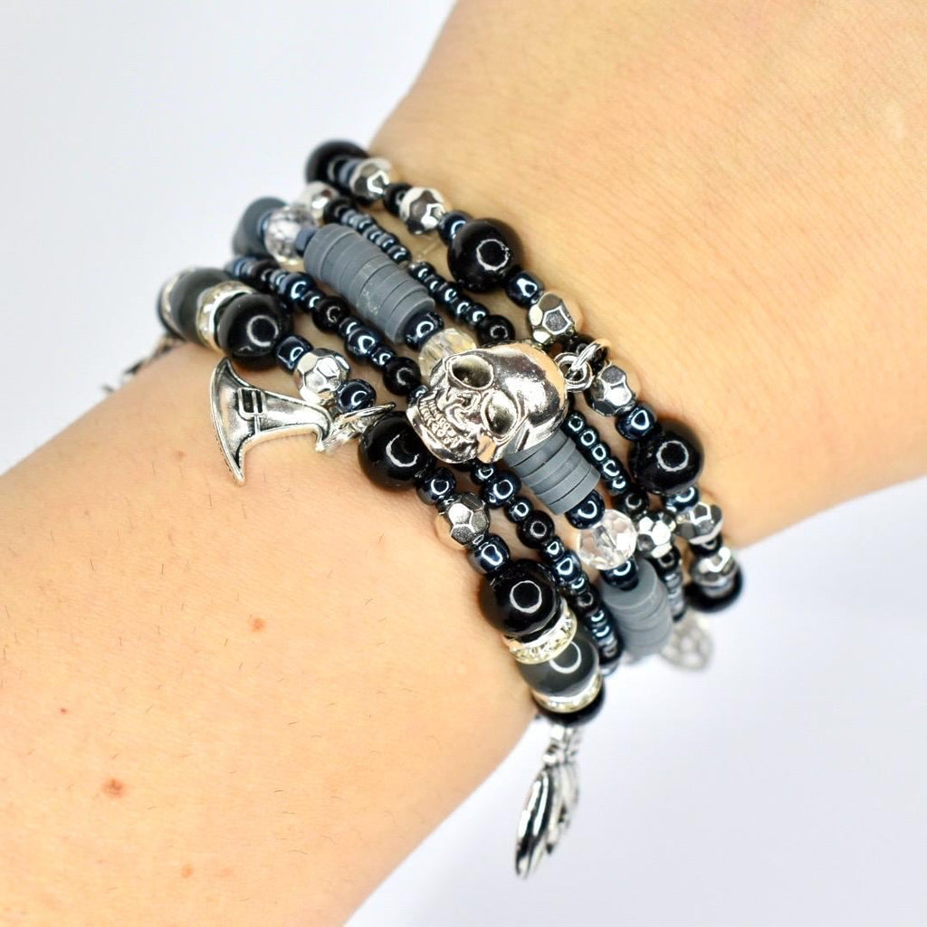 Gothic bracelet set – black and silver beaded wrap with spider, web, and skeleton hand charms for spooky goth accessories.