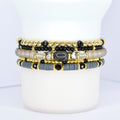 Black and gold tumbler bracelet – elegant beaded wrap with gray stone accents for reusable cups.