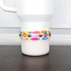 Colorful fruit tumbler bracelet – neon beads with strawberry and pineapple charms for fun summer cup accessories.