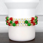 Christmas tumbler bracelet with red, green, and gold beads – ‘Naughty or Nice’ beaded wrap for festive holiday drinkware accessories.