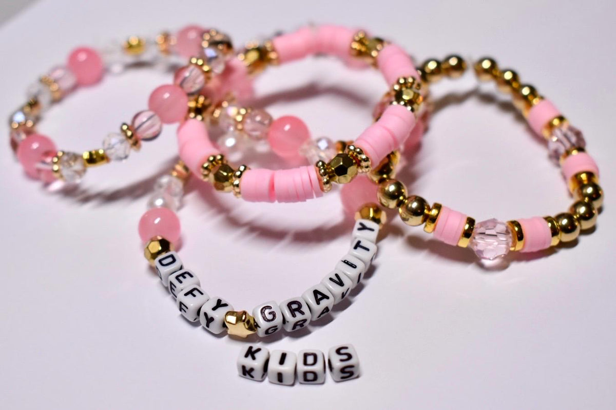 Defy Gravity Bracelet Collection: Pink and Gold Beaded Bracelets