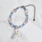 Kids Cinderella costume bracelet with rainbow crystal glass slipper charm, light blue gemstone beads, and metallic accents - Disney fairy tale wrist jewelry