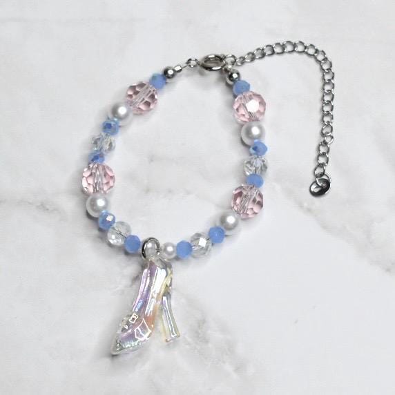 Kids Cinderella costume bracelet with rainbow crystal glass slipper charm, light blue gemstone beads, and metallic accents - Disney fairy tale wrist jewelry
