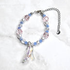 Cinderella inspired bracelet for kids with iridescent glass slipper charm, blue beads, white pearls, and pink crystal accents - Disney princess costume jewelry