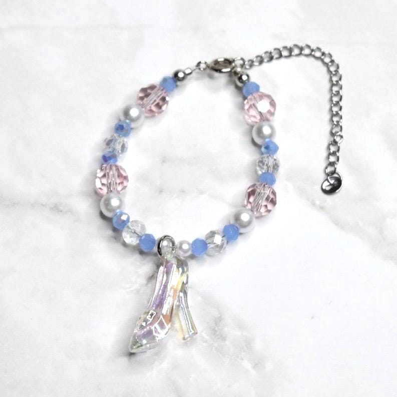 Cinderella inspired bracelet for kids with iridescent glass slipper charm, blue beads, white pearls, and pink crystal accents - Disney princess costume jewelry