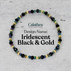 A beaded bracelet with black, iridescent, and gold beads. The bracelet is labeled "Iridescent Black & Gold" and is from the "Calathea Collective" design. The beads are strung together to form a circular shape.