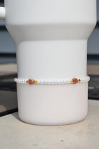 Pearl Beaded Bracelet with Pink Hearts and Gold Accents
