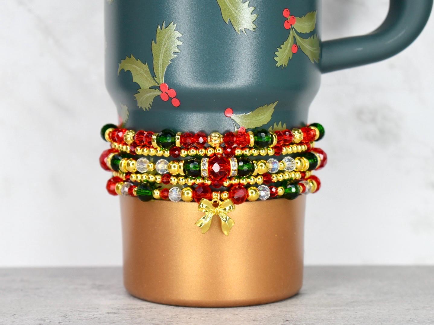 Holiday Botanical beaded bracelet stack designed for wrist or tumbler accessory handmade Christmas jewelry with holly charm and festive colors