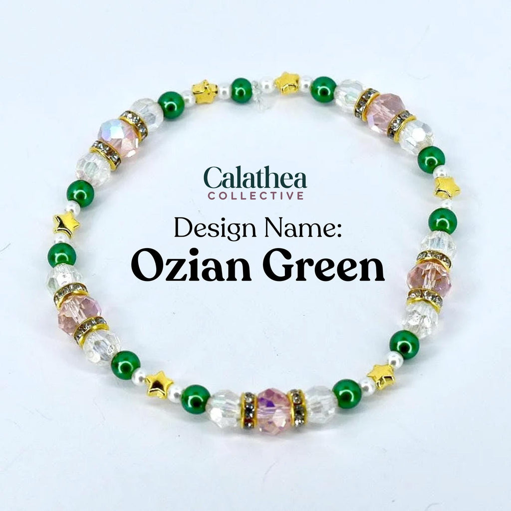 A beaded bracelet with the text "Calathea Collective" and "Ozian Green." The bracelet features clear, pink, green, and gold beads. The design includes star-shaped and round beads, with a mix of clear and pink crystal accents.