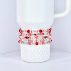 Stanley Tumbler Charm Accessory Holiday Bracelet Collection Candy Inspired Design Strawberry Twist Pattern Elastic Stretch Beaded Style Red Pink White Color Scheme Peppermint Christmas Theme Festive Wrist Wear Individual Pieces Mix Match