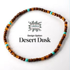 A beaded bracelet with a design option called 'Desert Dusk'. The bracelet is made of small, round beads in shades of brown, orange, and turquoise. The beads are strung together to form a circular shape.