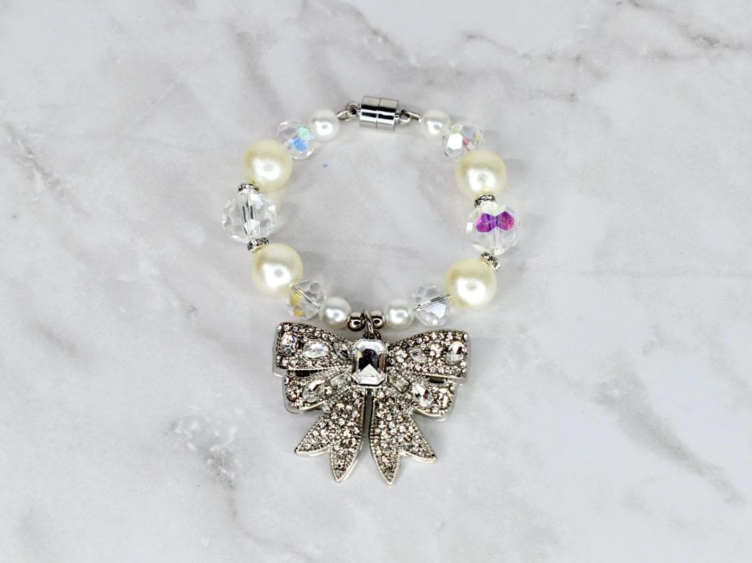 Pearl Elegance Bow Tumbler Handle Charm Bracelet