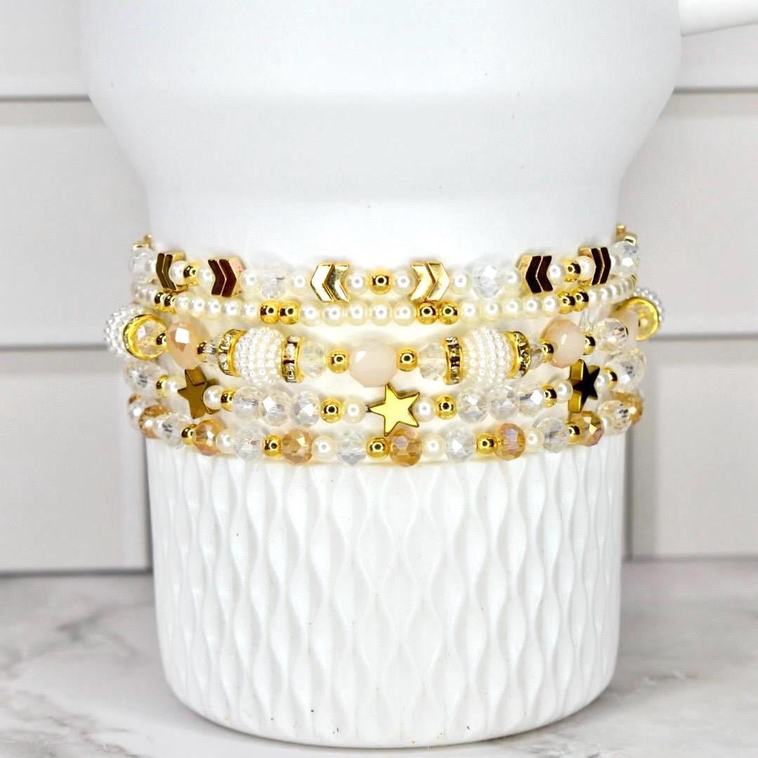 Starlight Shimmer Bracelet Collection Celestial Wrist Accessory Set Crystal Design Elegant Gift Luxe Birthday Present Five Piece Bracelet Set Pearl Gold Accents Dainty Layered Look Everyday Elegance Special Occasion Sparkle Magical