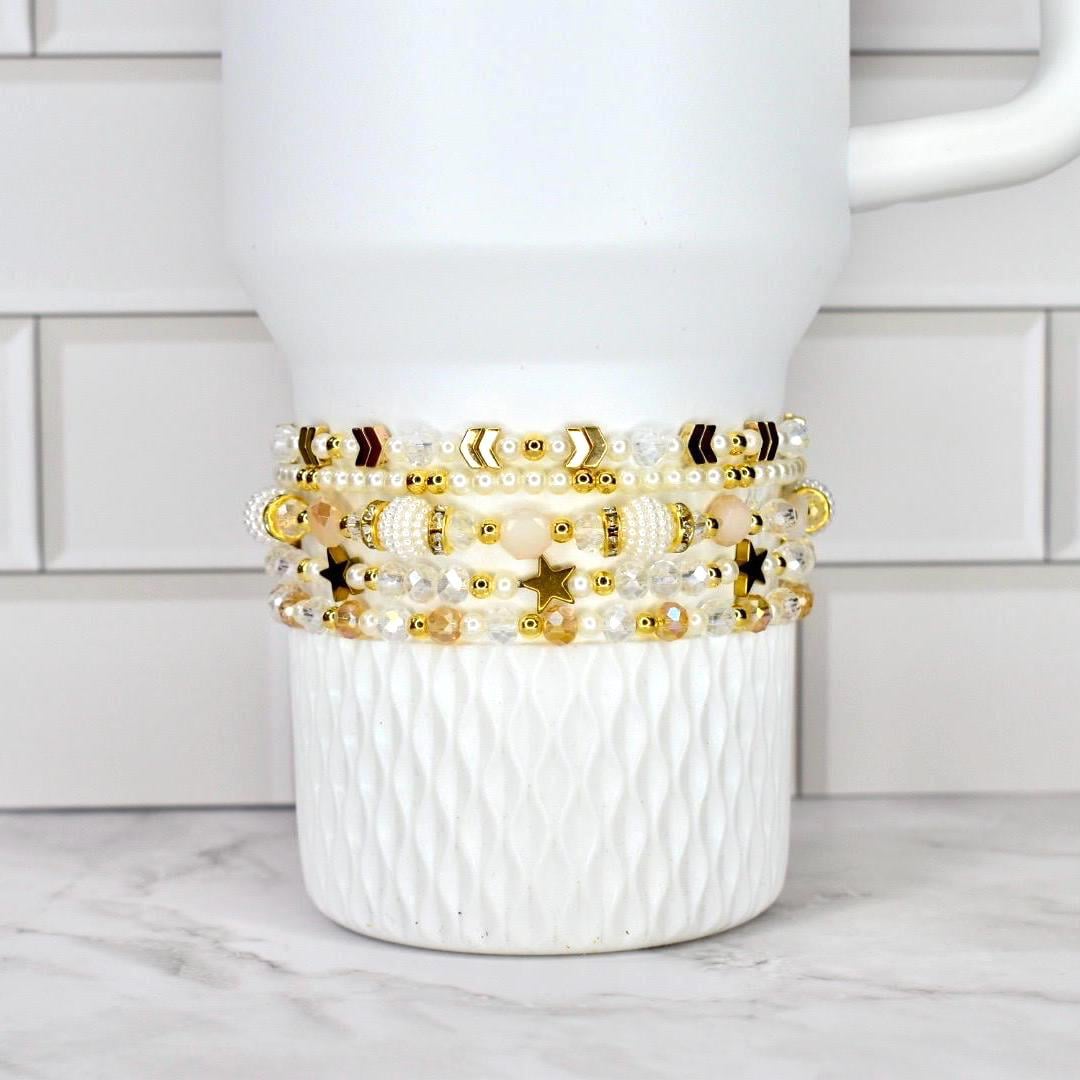 Shimmer Bracelet Set Starlight Collection Celestial Design Crystal Wrist Accessory Glass Pearl Combination Gold Accent Details Five Piece Bracelet Set Dainty Layered Look Magical Sparkle Effect Elegant Birthday Gift Luxe Present Idea