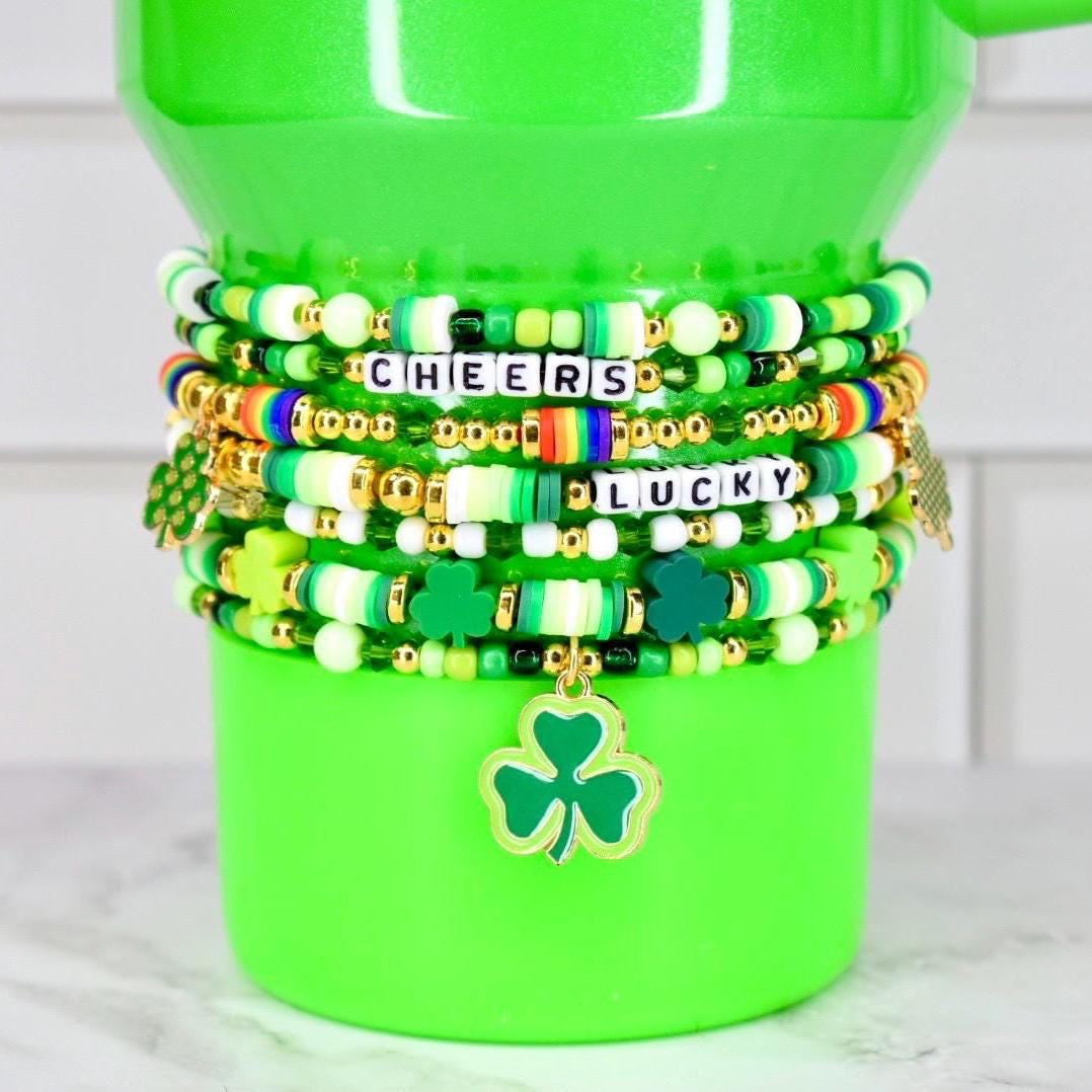 Shamrock Beaded Bracelet Irish Charm Jewelry Holiday Accessory Green Gold Design Festive Colors Elastic Band Lucky Clover Pattern Celebration Wear Stacking Bracelets Collection Festive Outfit Addition March Holiday Tradition Tumbler