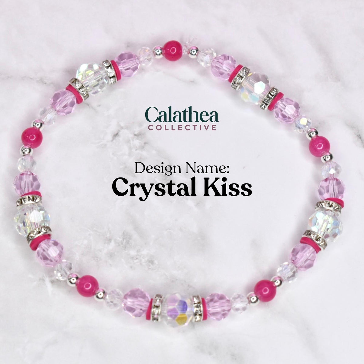 A beaded bracelet with the text "Calathea Collective" and "Design Name: Crystal Kiss". The bracelet features pink, clear, and silver beads. The bracelet is on a white and gray marble surface.