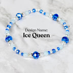 A beaded bracelet with the design name "Ice Queen." The bracelet features a mix of blue, light blue, and clear beads. Larger faceted blue beads are interspersed with smaller round beads and clear crystal beads.