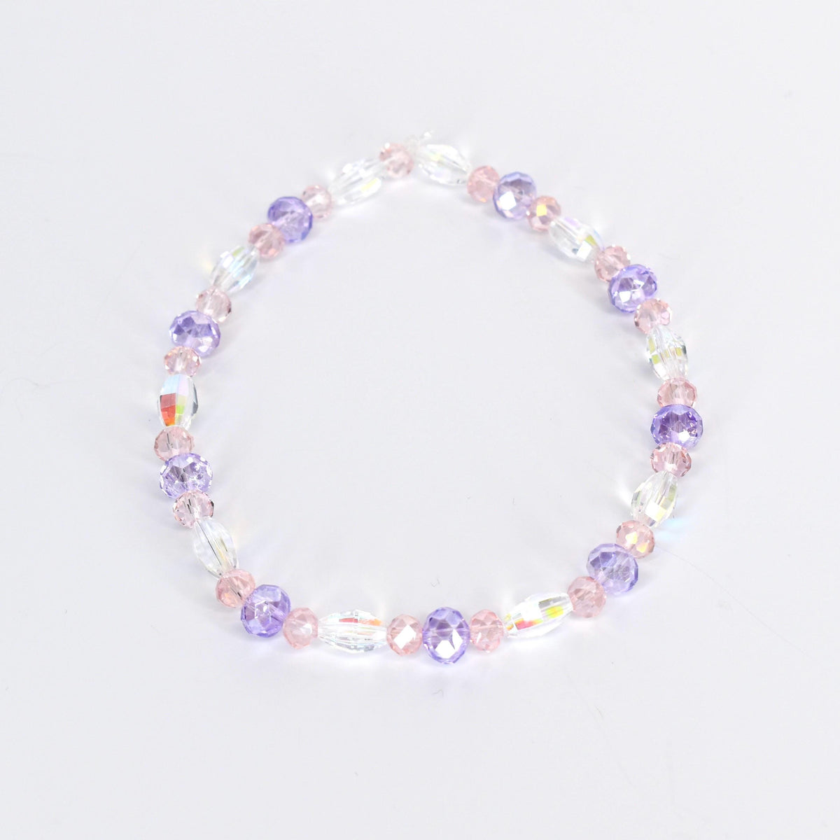 A delicate bracelet featuring a mix of clear, iridescent, and pastel-colored beads. The design incorporates oval and round beads in shades of pink and purple, creating a subtle, feminine accessory.