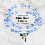 Two beaded bracelets with blue and white beads, and a silver bow charm. The necklaces are labeled "Blue Bow Beauty" and are displayed on a marble surface. The beads are a mix of round and crystal-like shapes.