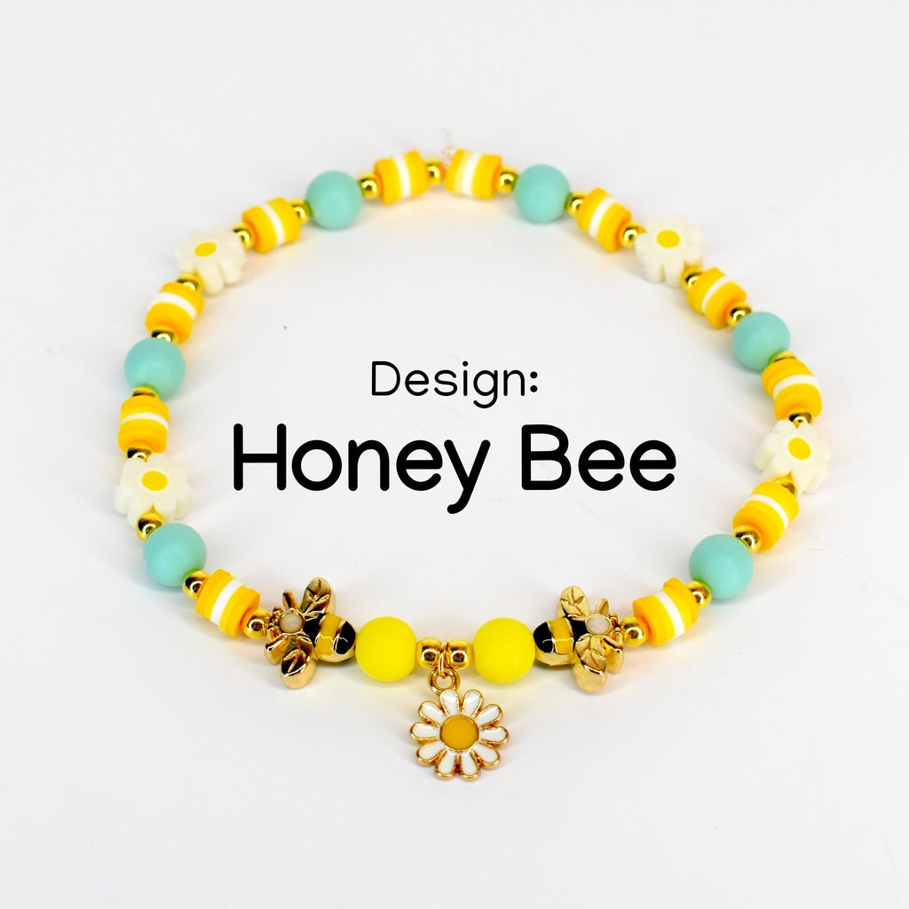 Yellow and mint honey bee charm bracelet with gold bee charms, enamel daisy charm, yellow and white striped beads, flower beads and matte seafoam green round beads – handmade bee themed jewelry