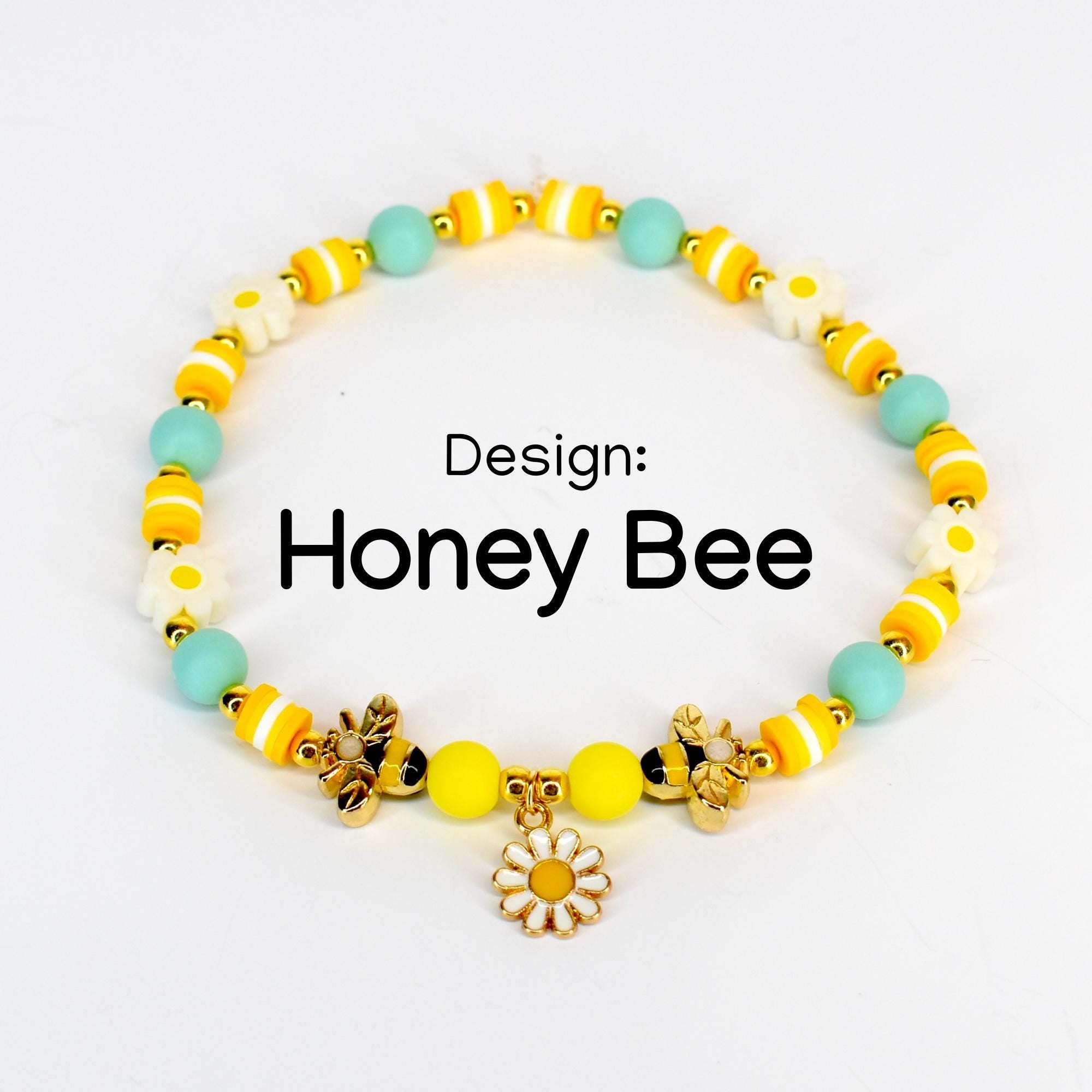 Yellow and mint honey bee charm bracelet with gold bee charms, enamel daisy charm, yellow and white striped beads, flower beads and matte seafoam green round beads – handmade bee themed jewelry