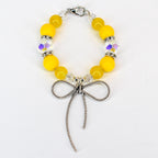 Daffodil Yellow Tumbler Handle Bracelet with Silver Bow Charm