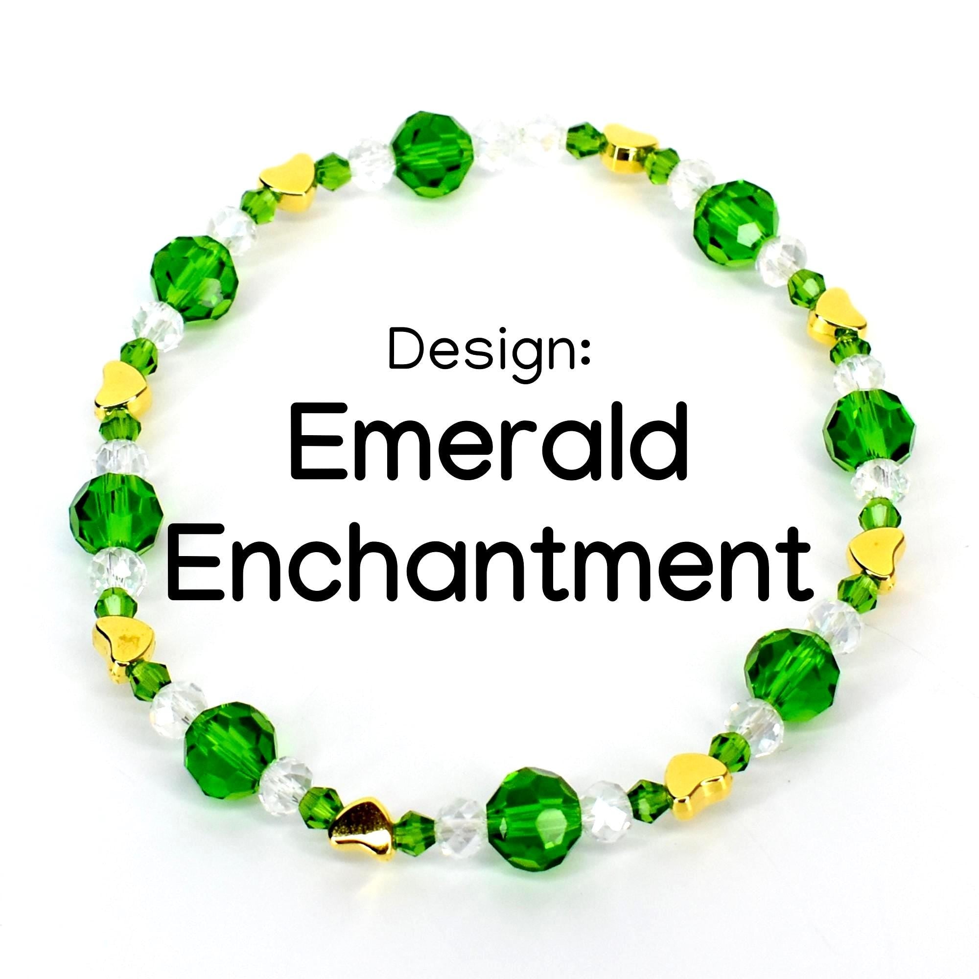 A beaded bracelet with the text "Emerald Enchantment." The bracelet features faceted emerald green beads, clear beads, and small gold heart-shaped beads. The design is set against a white background.