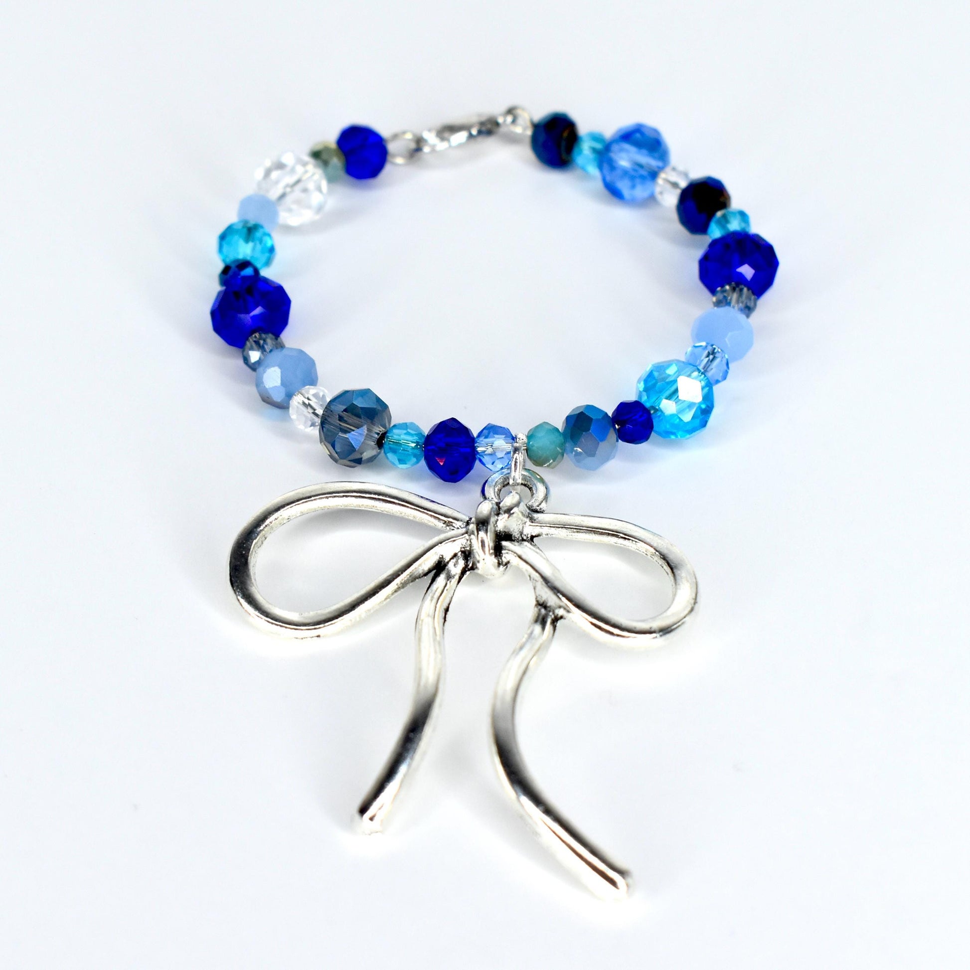 Blue and Crystal Tumbler Handle Bracelet with Bow Charm