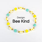 Yellow and mint daisy flower bead bracelet with white and yellow flower beads, matte seafoam green round beads, gold spacer beads and clear crystal beads – handmade bee kind spring bracelet
