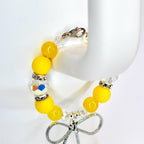 Daffodil Yellow Tumbler Handle Bracelet with Silver Bow Charm