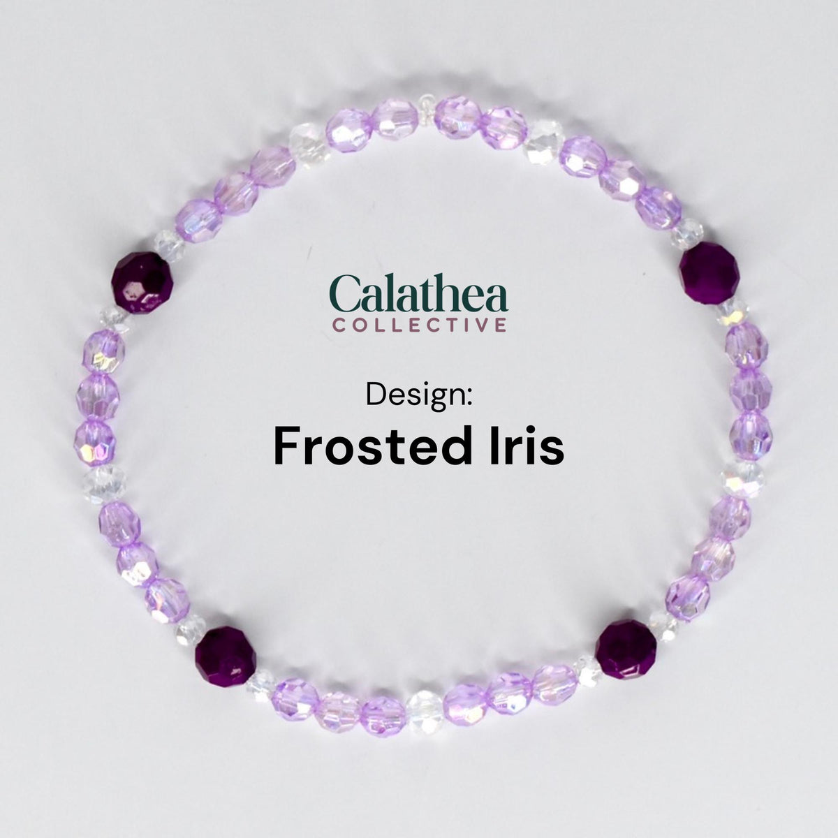 A bracelet featuring a design called "Frosted Iris." The bracelet is composed of small, light purple and clear beads, with larger, deep purple beads interspersed throughout. The text "Calathea Collective" and "Design: Frosted Iris" are also visible.