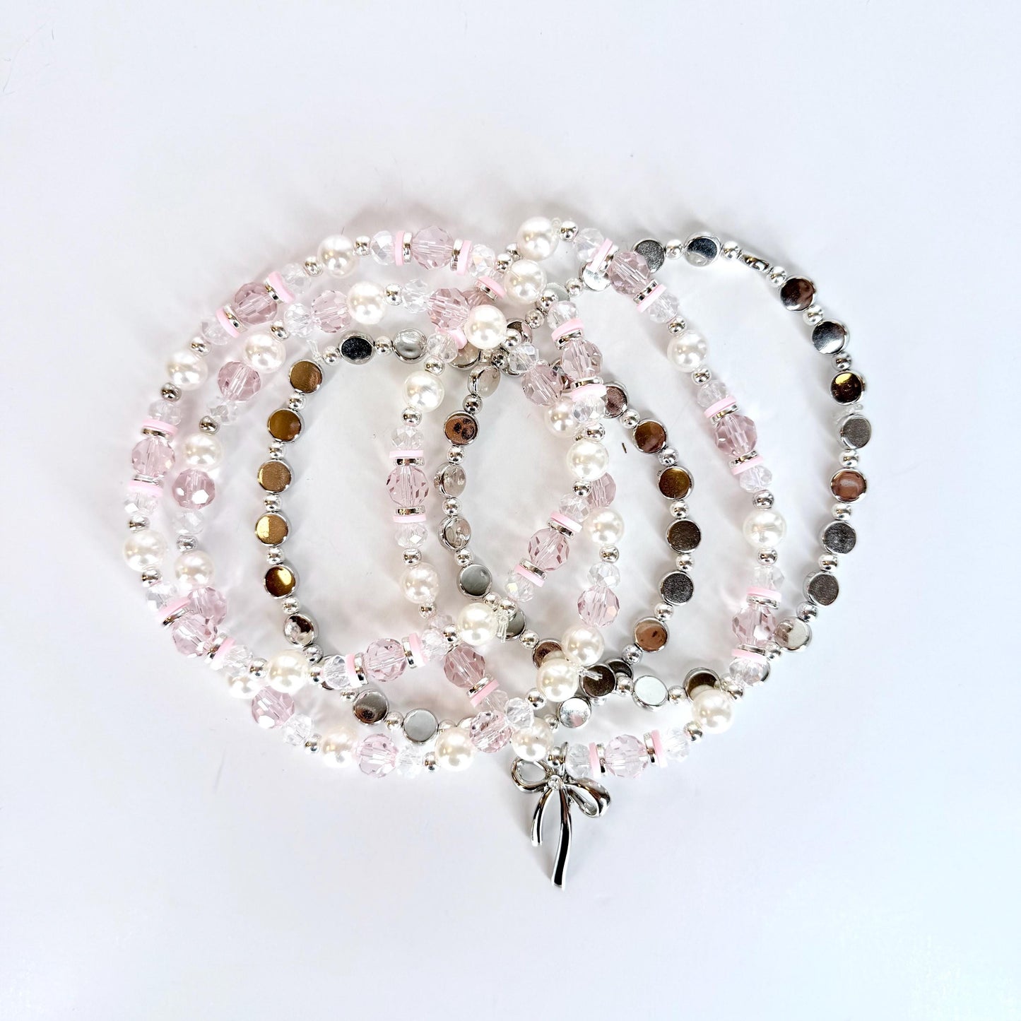 Pink and Silver Bracelet Collection with Silver Bow Charm