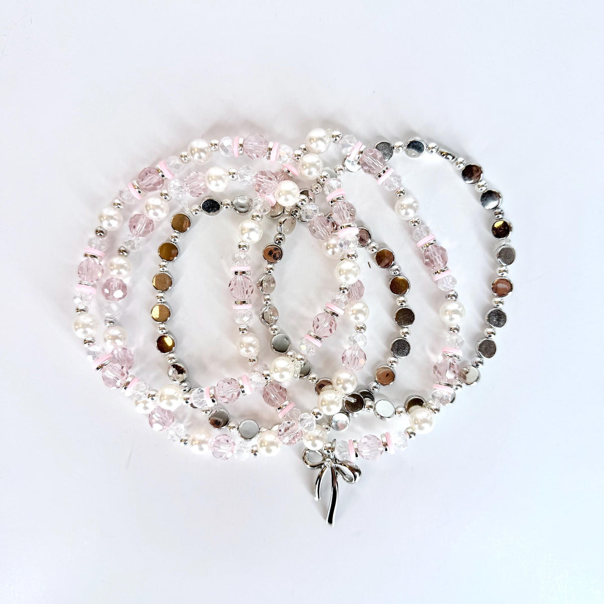 Pink and Silver Bracelet Collection with Silver Bow Charm