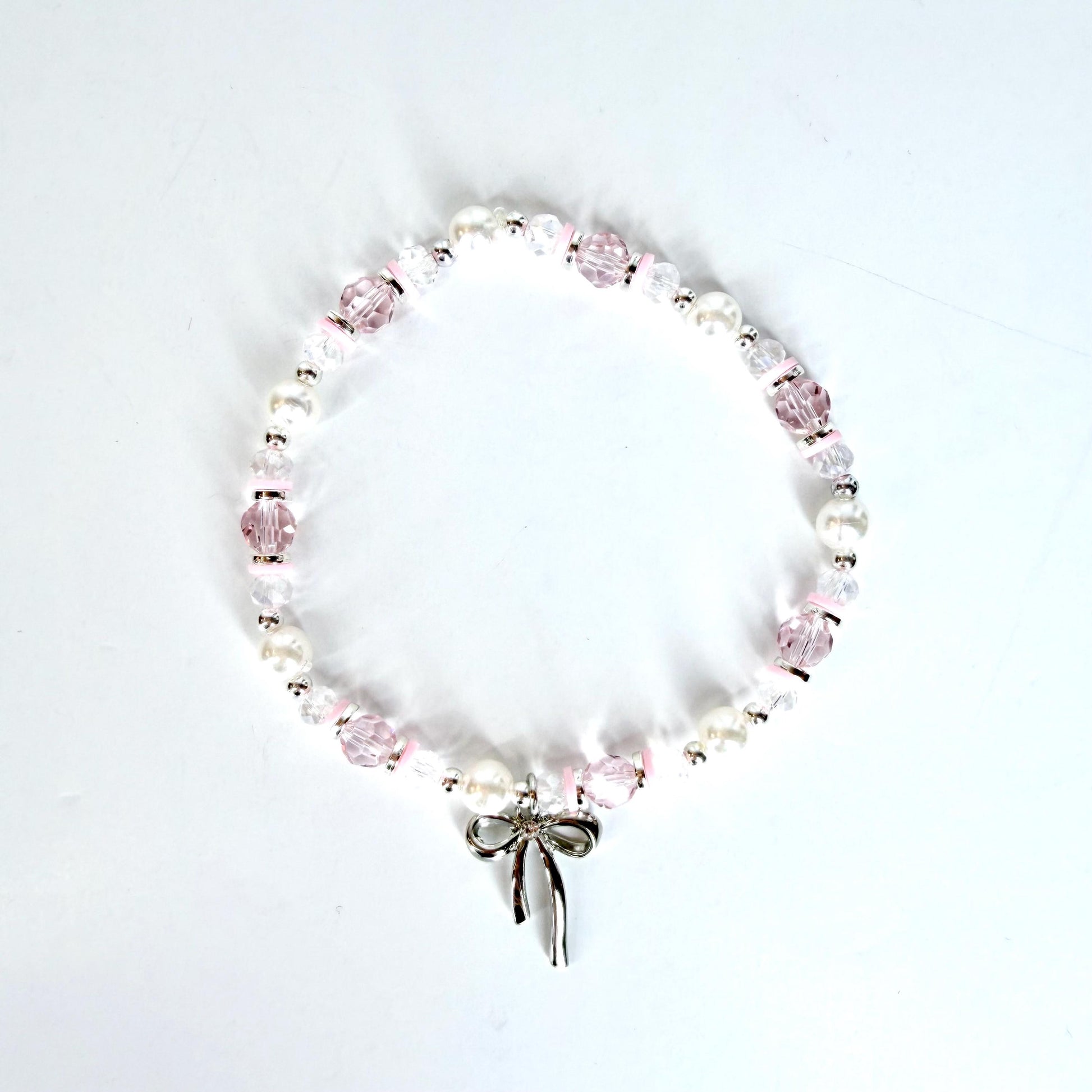 Pink and Silver Bracelet Collection with Silver Bow Charm