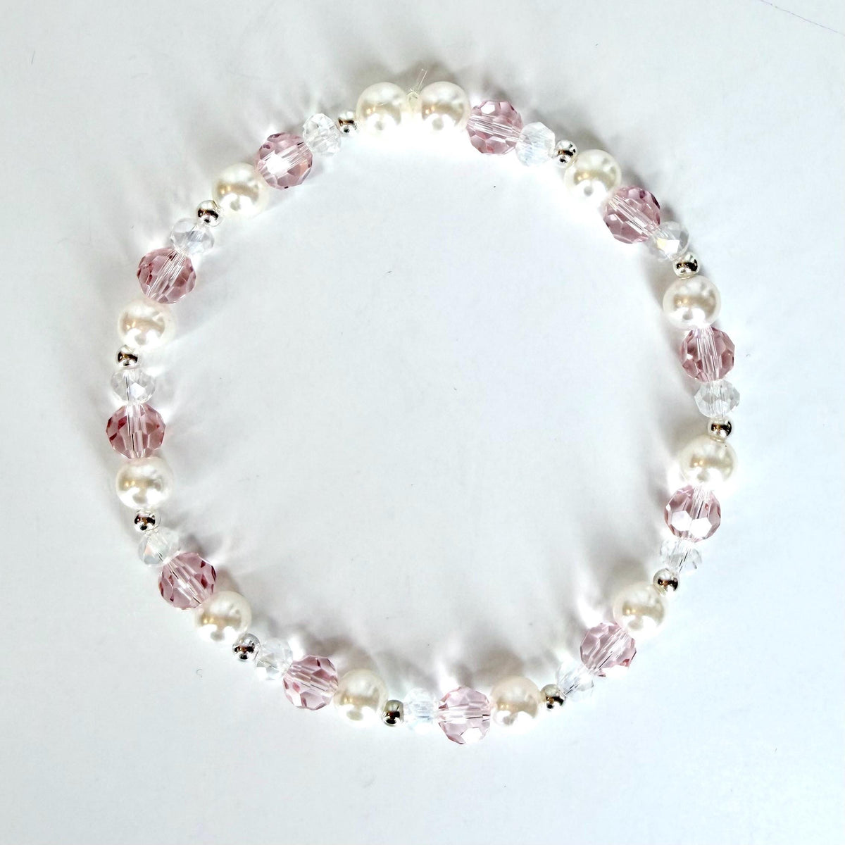 Pink and Silver Bracelet Collection with Silver Bow Charm